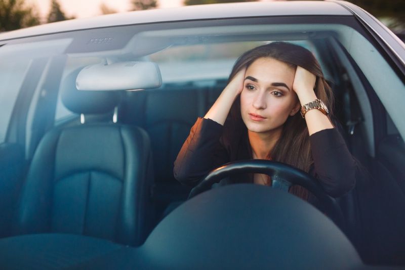woman stressed after being pulled over