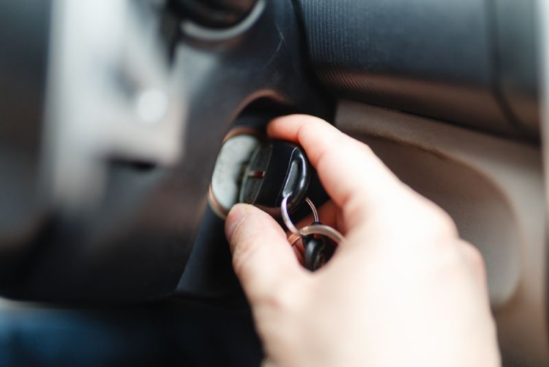 Set of keys being put into the ignition of a car
